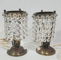 Full view of both 1960s vintage table lamps with crystal prisms showing bases, prisms, and electrical cords.