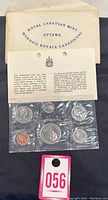 Original unopened white envelope from Royal Canadian Mint with certificate and set of six coins in original mint plastic sleeve.