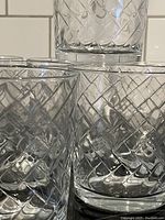 Close-up image showing the detailed lattice design on the scotch glasses.