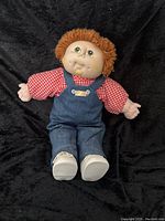 Full front view of 1984 Cabbage Patch Doll Dustin James showing entire doll and outfit