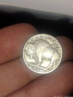 Reverse side of the Buffalo Nickel showing standing buffalo and inscriptions