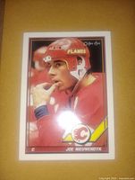 Front of the Joe Nieuwendyk hockey card showing player portrait and Flames logo.