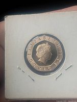 Obverse side showing Queen Elizabeth II profile and inscriptions.