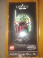 Front view of the sealed Lego Star Wars Boba Fett bust box showing the helmet and branding.