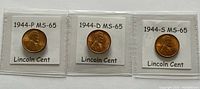Obverse side of three Lincoln Cents graded MS-65 or better, showing Abraham Lincoln's profile and mint marks 1944-P, 1944-D, 1944-S.