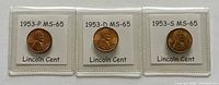 Front view of three 1953 Lincoln cents graded MS-65, showing obverse with Lincoln portrait and mint marks P, D, S in holders.