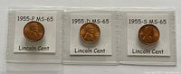 Obverse view of three Lincoln Wheat Cents from 1955 labeled 1955-P MS-65, 1955-D MS-65, and 1955-S MS-65.