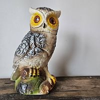 Front view of vintage plaster owl figure showing full body detail, colors, and base