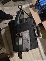 Side view of Bosch PBS 75A belt sander showing power cord and handle