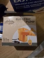 Tera Gear electric pump packaging showing product name and features.