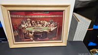 Overall front view of framed print showing dogs playing poker in a red-walled room