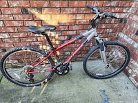 Side profile photo of the full Gary Fisher mountain bike showing the frame, tires, saddle and pedals.