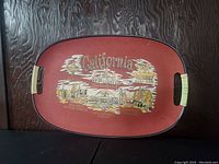 Top view of rectangular vintage California tray showing landmarks like Disneyland, Universal Studios, Knott's Berry Farm. Fiberglass construction with molded handles and retro design.