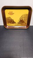 Full front view of the vintage Coca Cola 60th Anniversary metal tray showing the printed street scene and logo.