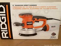 Box of Ridgid 6" Random Orbit Sander showing product image and brand name