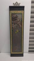Full view of the Japanese wood hanging carving showing two monkeys on a tree with fruit and decorative border.