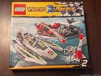Front of LEGO World Racers 8897 Jagged Jaws Reef box showing the set contents and racing scene illustration.