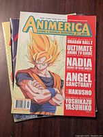 Cover of Animerica magazine featuring Super Saiyan Dragon Ball Z character, highlighting articles on Dragon Ball Z, Nadia, Angel Sanctuary, and Yu Yu Hakusho.