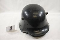 Right-front profile view of helmet shell with lot marker '4'