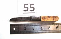 Full view of open folding pocket knife with bone handle next to ruler showing total length about 6 inches and blade length at 2.5 inches. Blade marked with 'George Furness'.
