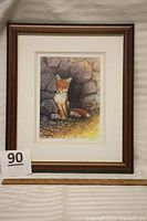 Full view of framed fox print titled "My Own Den" with ruler for scale.