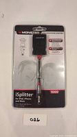 Front view of sealed Monster iSplitter adapter in packaging with brand and model visible.
