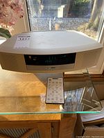 Front view showing Bose Wave II radio unit with digital display