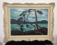 Full view of painting and ornate cream frame