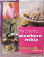 Front cover of Rosa's New Mexican Table cookbook showing author and food dishes.
