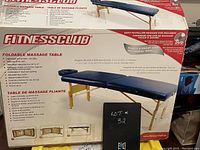 Full box showing side with product image and features.