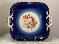 Square antique Bavaria cake plate with deep blue ornate border and central floral bouquet design.