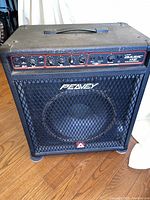 Front view of Peavey Basic 112 bass amplifier showing control panel and grille