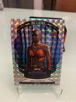 Front of the 2022 Upper Deck Marvel Allure trading card showing Danai Gurira as Okoye with holographic diamond pattern background.