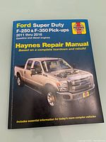 Front cover of Haynes repair manual showing a Ford Super Duty pick-up truck and detailed text about coverage for 2011-2016 Ford F-250 and F-350 pick-ups