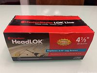 Top view of the Original box of FastenMaster HeadLOK Structural Wood Screws, showing brand and product info.