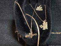 All six pieces displayed on black background