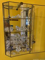 Front view of mounted display case showing contents