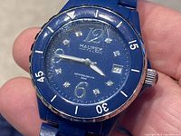 Front close-up of blue Haurex women's wristwatch with visible hour markers and date display.