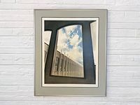 Framed serigraph artwork of Althouse Teachers College showing Brutalist architectural concrete window frames and sky