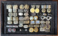 Tray with approximately 28 pairs of cufflinks arranged in rows
