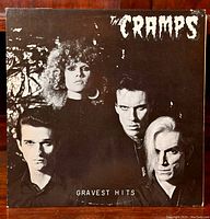 Front cover photo of The Cramps' Gravest Hits vinyl EP showing all four band members in black and white with the title and band name.