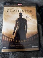 Front cover of Gladiator DVD Signature Selection showing Russell Crowe in armor and title.