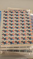 Sheet of blue and red fish design 6 cent Canadian stamps