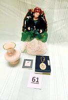 Photo of all three items together: Irish angel tree topper, Lenox Elfin bud vase, Barlow key chain in box, and lot number card