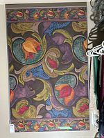 Full view of framed fabric art print showing complete design and frame.