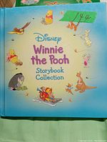 Cover photo of the Disney Winnie the Pooh Storybook Collection hardcover book showing classic characters and title.