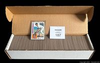 Full box containing the complete set of 1984 Topps Baseball cards, with a Don Mattingly rookie card displayed on top.