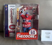 Front view of sealed Jose Theodore McFarlane NHL Series 10 Montreal Canadiens hockey figurine in packaging.