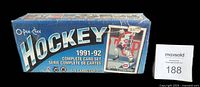 Front side of sealed blue box labeled O-Pee-Chee Hockey 1991-92 complete card set with 528 cards, original shrink wrap visible.