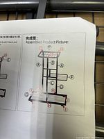 Assembly instructions showing diagram of the mini table shelf with labeled parts A, B, C, F, G, H, I illustrating the final assembled structure.